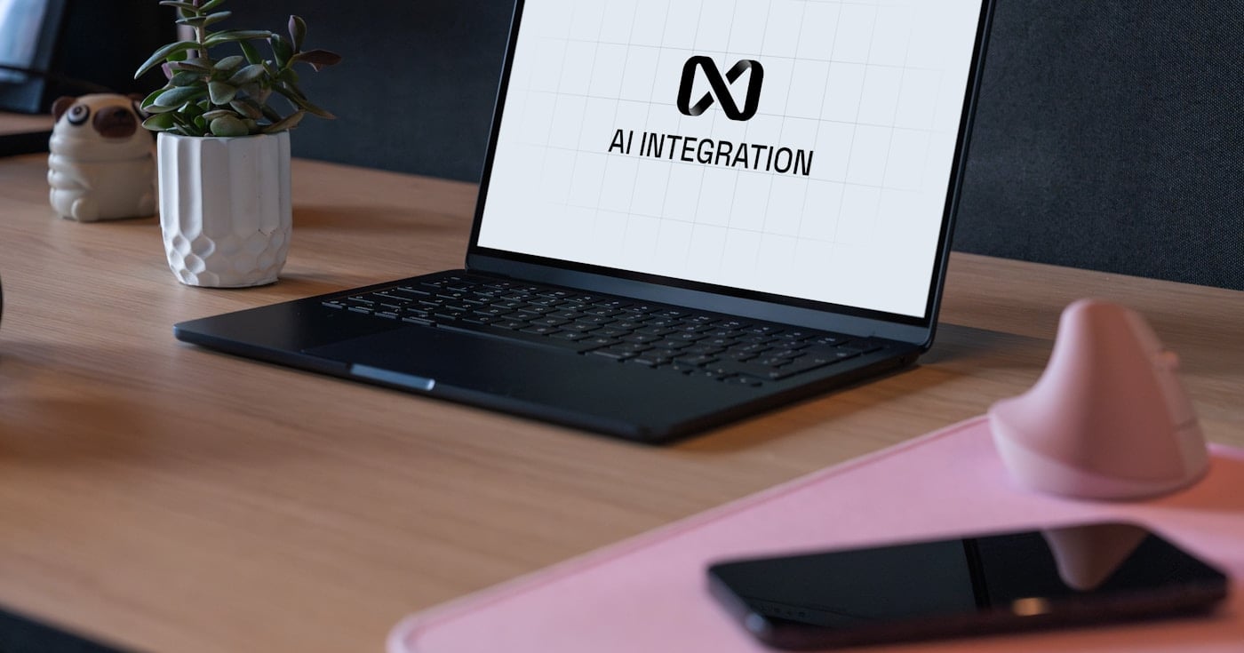 AI solutions for business — a professional uses AI-powered tools at their desk